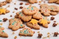 Festive Christmas ginger and honey colorful cookies on white board Royalty Free Stock Photo