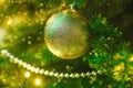 Festive Christmas greeting card, blurred effect. New Year holiday concept. Shiny baubles, garland
