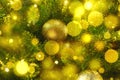 Festive Christmas greeting card, blurred effect. New Year holiday concept. Shiny baubles, garland