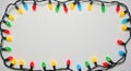 Festive Christmas lights frame with colorful bulbs and wires Royalty Free Stock Photo