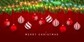 Festive Christmas or New Year Background. Christmas fir-tree branches with light garland and xmas red balls. Holiday`s Background Royalty Free Stock Photo