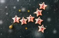 Festive Christmas or New Year concept background. Icing gingerbread star cookies with numbers. Top view. Toned. Royalty Free Stock Photo