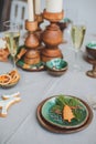 Festive Christmas and New Year table setting in scandinavian style with rustic handmade details in natural and white Royalty Free Stock Photo