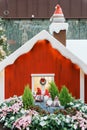 Festive Christmas scene featuring a playful Santa Clause and his adorable reindeer