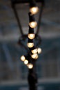 Festive Christmas string of lights strung between lampposts