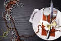 festive Christmas table place setting on wooden background Royalty Free Stock Photo