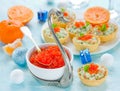 Festive Christmas table with refreshments - red caviar in a bowl Royalty Free Stock Photo