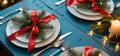 Christmas Table Setting Decorated with Red and Green Holiday Accents Royalty Free Stock Photo