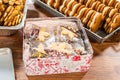 Festive Christmas Tin Boxes Filled with Chocolate-Dipped Treats