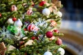 Festive christmas tree with colorful ornaments and snowflake decorations Royalty Free Stock Photo