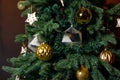 Festive Christmas Tree with Gold and Silver Ornaments Royalty Free Stock Photo