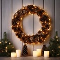 Festive Christmas wreath with lights bow and cones. Royalty Free Stock Photo