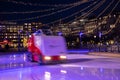 Festive city. Winter in Stockholm. Machine cleaning Ice. Sweden, Stockholm Royalty Free Stock Photo