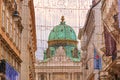 Festive cityscape - view of the St. Michael`s Wing of the Hofburg during the Christmas days in the city of Vienna Royalty Free Stock Photo