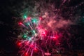 Festive colorful fireworks in the night sky, abstract background Royalty Free Stock Photo