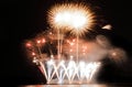 Festive colorful fireworks on night sky background. Celebratory holiday Royalty Free Stock Photo