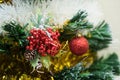 Festive colorful decorations on christmas tree closeup