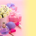 Festive composition with gift box with vase flowers chrysanthemum cosmetics perfume sponge Bright saturated background is a gradie