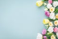 Festive composition for Happy mothers day. Spring colorful flowers on pastel blue background