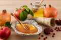 A festive composition of the Jewish New Year of Roshkasan. traditional symbols of the holiday - ripe apples, honey, pomegranate.