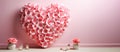 Festive composition from roses in shape of heart for Valentine\'s day on light pink background