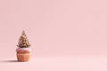 Festive Christmas Tree Cupcake on Pink Background Royalty Free Stock Photo