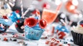 Festive cupcake with red sunglasses in colorful party setting Royalty Free Stock Photo