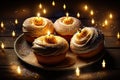festive cupcakes top doughnuts on board for party with candles and burning sparks