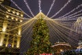 Festive decorated spruce for Christmas and New Year on Manezhnaya Square on a frosty winter evening.