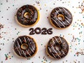 Festive 2026 Donuts with Colorful Sprinkles Royalty Free Stock Photo