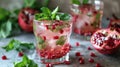 Festive drinks, pomegranate cocktail. Mint mocktail with pomegranate Royalty Free Stock Photo