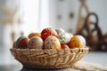 Festive Easter Basket with Brightly Colored Eggs against a Soft, Blurred Background Royalty Free Stock Photo