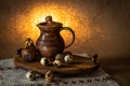 Festive Easter still life with eggs and earthenware jug. Blank for cards Royalty Free Stock Photo