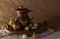 Festive Easter still life with eggs and earthenware jug. Blank for cards Royalty Free Stock Photo