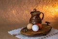 Festive Easter still life with eggs and earthenware jug. Blank for cards Royalty Free Stock Photo