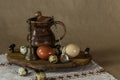 Festive Easter still life with eggs and earthenware jug. Blank for postcards Royalty Free Stock Photo