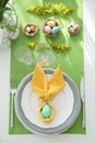 Festive Easter table setting with floral decor and eggs, flat lay Royalty Free Stock Photo