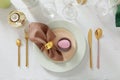 Festive Easter table setting with painted egg and candle, flat lay Royalty Free Stock Photo