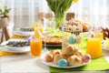 Festive Easter table setting with traditional meal at home Royalty Free Stock Photo