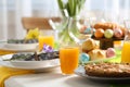 Festive Easter table setting with traditional meal at home Royalty Free Stock Photo