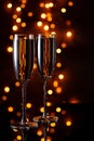 Festive evening together. Two glasses of wine against the lights Royalty Free Stock Photo