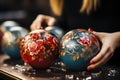 Festive factory job: woman crafting Christmas balls