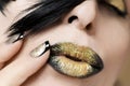 Festive fashion black gold make up and French manicure