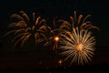 Festive fireworks in the night sky. Bright multi-colored salute on a black background. Place for text Royalty Free Stock Photo