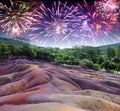 Festive fireworks over Chamarel. Mauritius main tourist site, land of seven different colors, mixed media Royalty Free Stock Photo