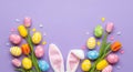 Spring tulips eggs and bunny ears on lavender Royalty Free Stock Photo