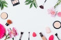 Festive flat lay frame of makeup products