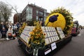 Festive float decorated with a vibrant floral arrangement at the Flower Parade Bollenstreek