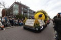 Festive float featuring a decorated egg positioned on its back at the Flower Parade Bollenstreek