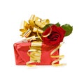 Festive gift with red rose